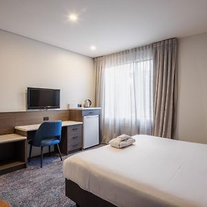 Standaard Kamer met Rolstoeltoegankelijkheid met een King Size Bed